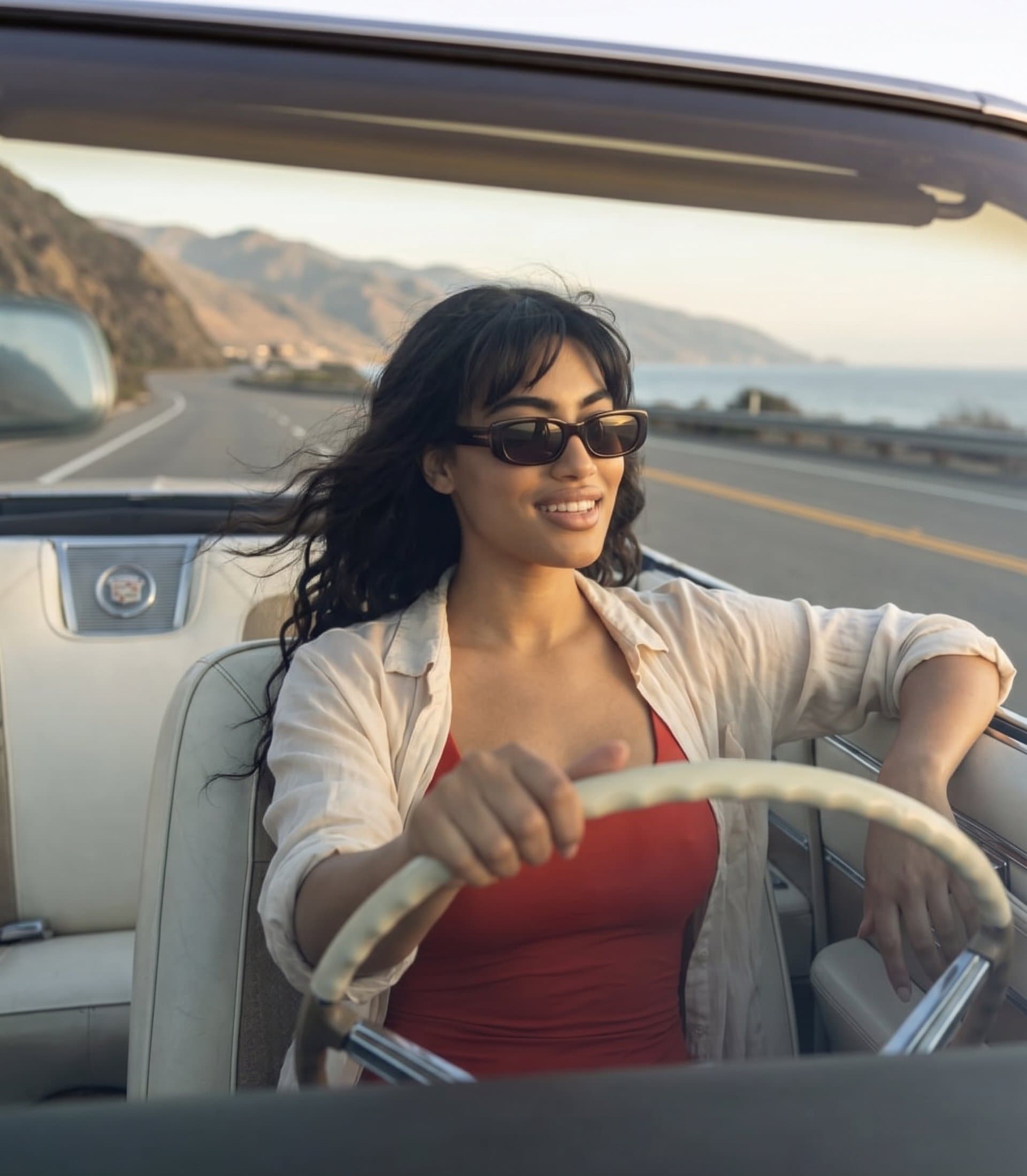 driving a car, confident beautiful woman, road tri
